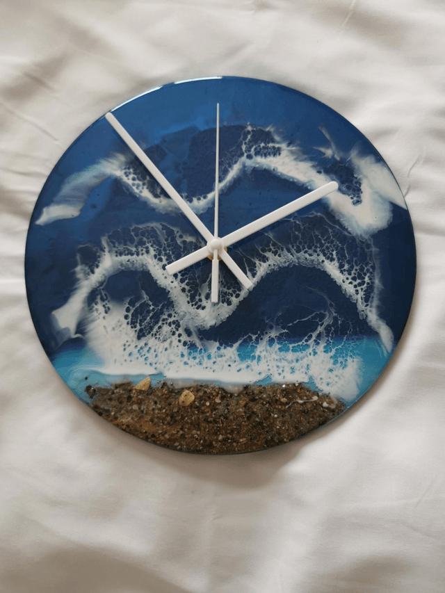 Small wooden backed seascape clock