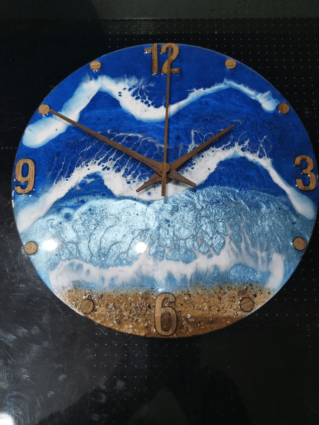 Small wooden backed seascape clock