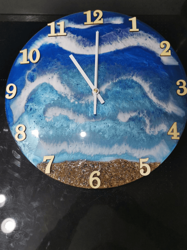 Large wooden backed resin wall clock